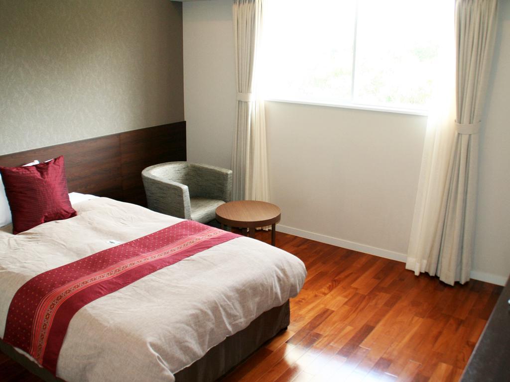Hotel Hamahigashima Resort Uruma Exterior photo